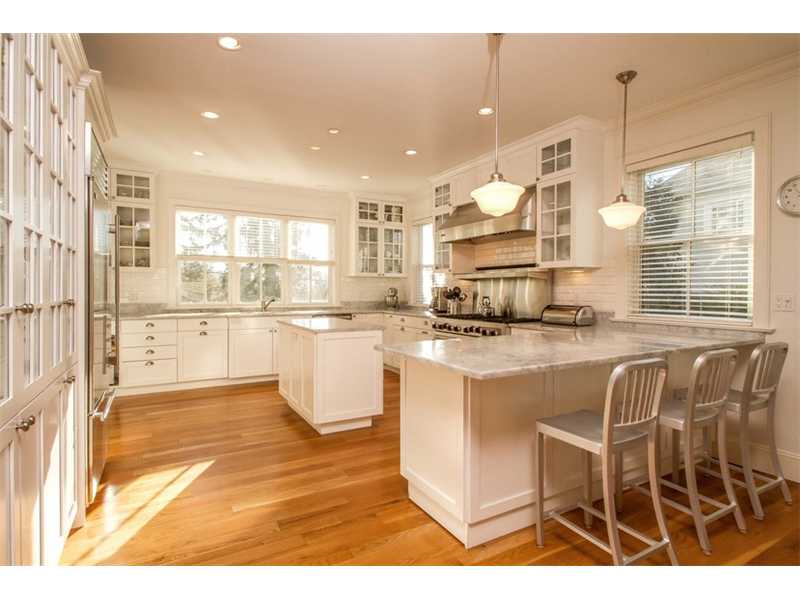Fabulous and well planned kitchen that open up to the...