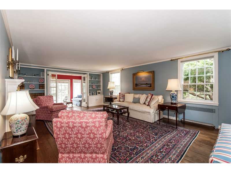 Living room at 3 Nolan Lane. Note sunroom at the end.