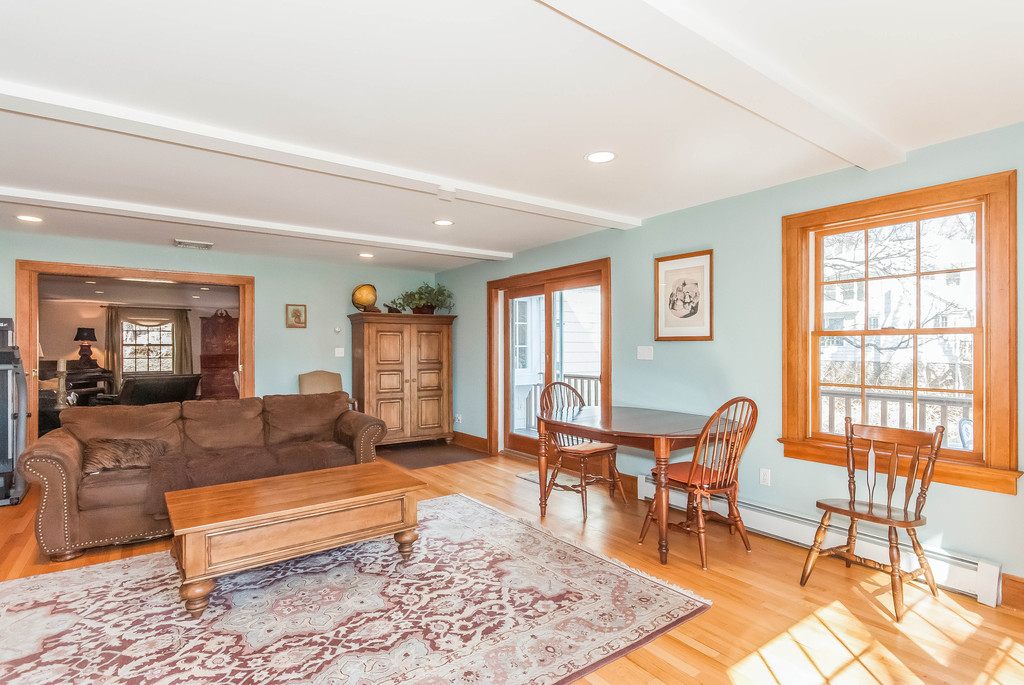 The Family Room is sun filled and has doors leading to the screened in porch as well as the wrap around deck. I can not emphasize enough how much sunlight you get in this room!