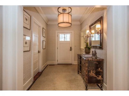 Welcome.  An inviting front hall, lots of closets and the gateway to a very livable house.