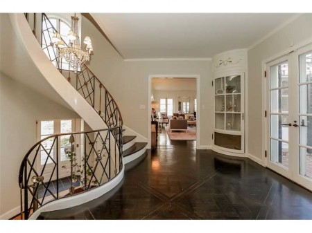 Notice the front door down below, the sensational staircase and its iron railings.  This mail floor landing speaks for its self.  Gorge!