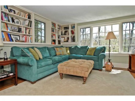 Love that pop of turquoise.  Of course it is not staying with the house, but it shows you what a pop of color can do here.
