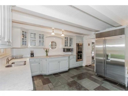 The Kitchen is sleek and modern with touches of a house built in the 1920's.  