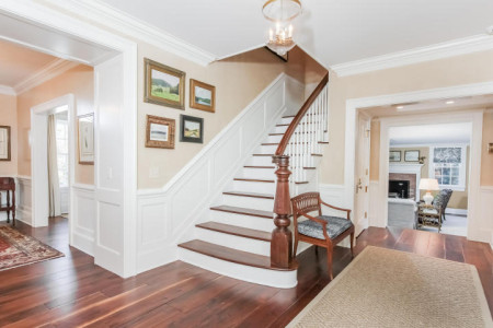 Original staircase and details remain from when the house was built.