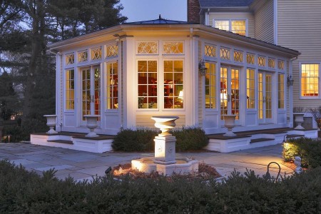 Recently added to the house, this lovely conservatory has a copper roof, radiant heat floors, and a wet bar. Opening up to the terrace and gardens, it is a very special part of this house. 